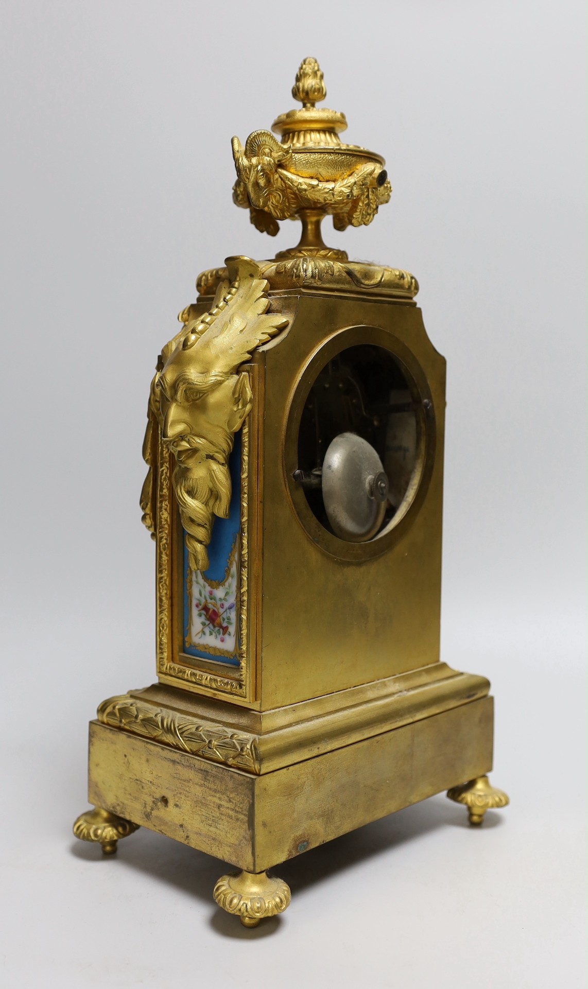 A 19th century French ormolu and Sevres style porcelain mounted mantel clock, 38cms high